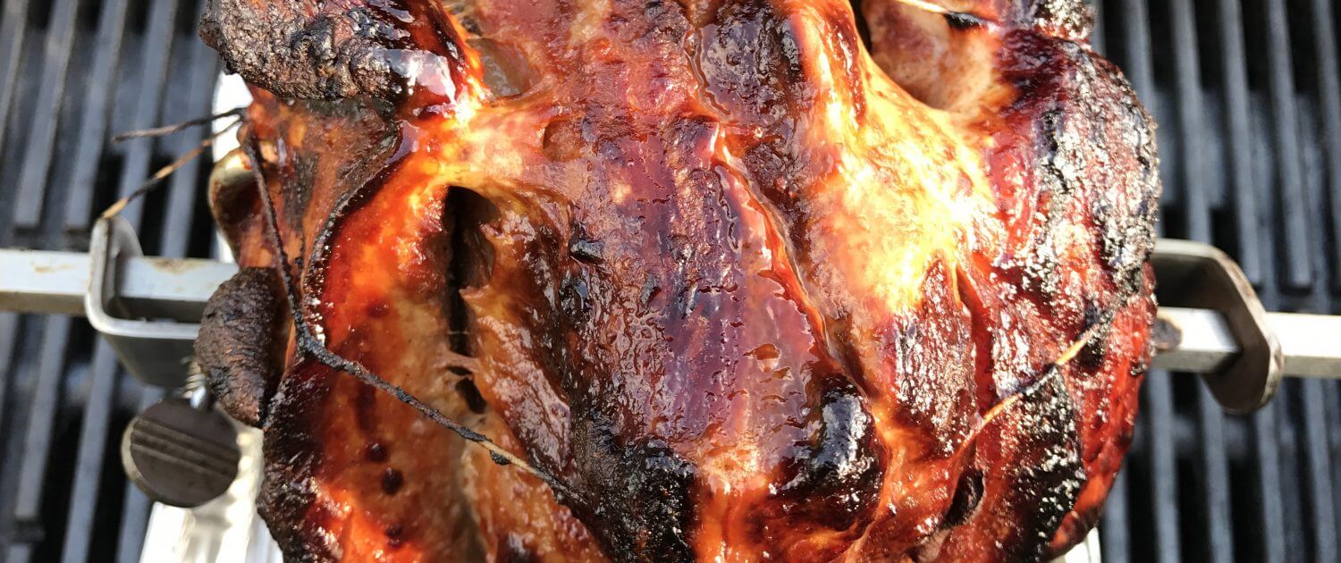 Schweinebraten von der Rotisserie