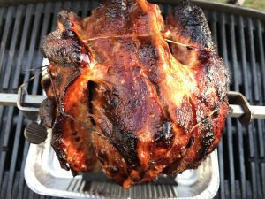 Schweinebraten von der Rotisserie