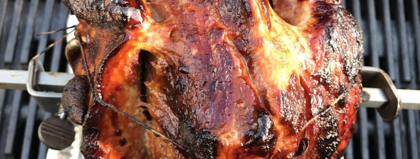 Schweinebraten von der Rotisserie
